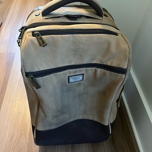 Burton Carryon Suitcase - great condition, outside discoloured from travel!